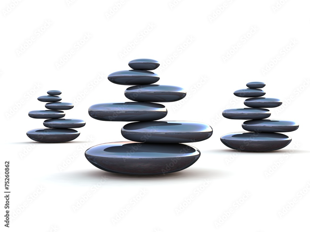 Pebbles stacked on each other on a white background Pebbles stacked on each other on a white background