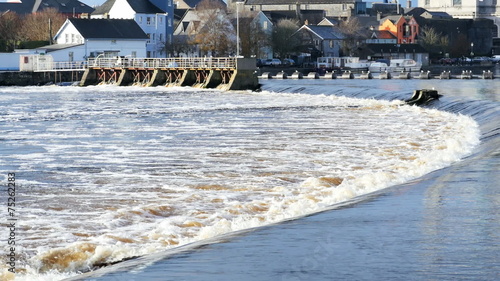 View at hydroelectric power plant on river in Ireland
