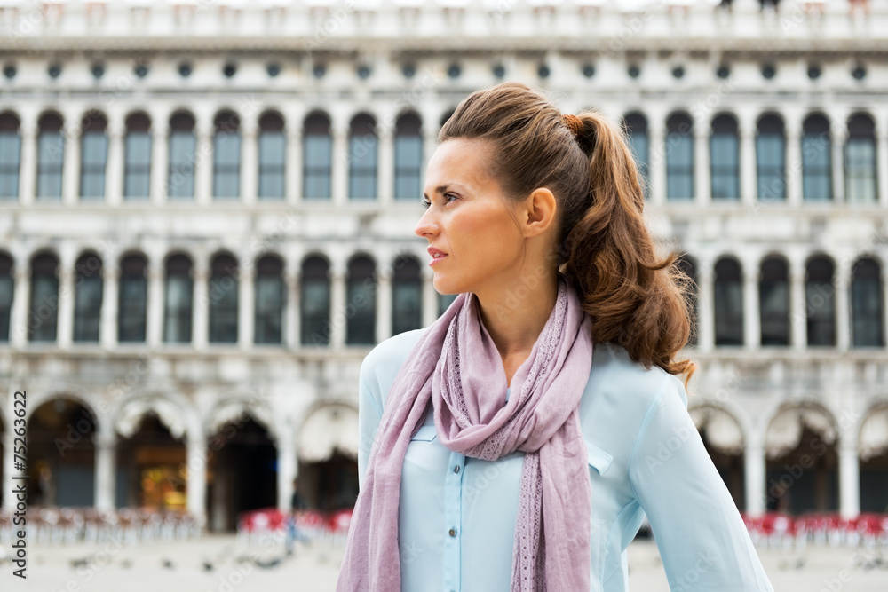 Portrait of young woman on piazza san marco in venice, italy