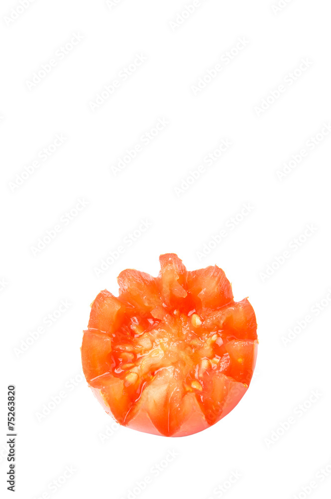 Carved tomato fruit over white background Carved tomato fruit over white background