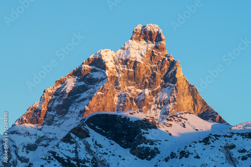 cervino matterhorn mountain in a winter sunrise