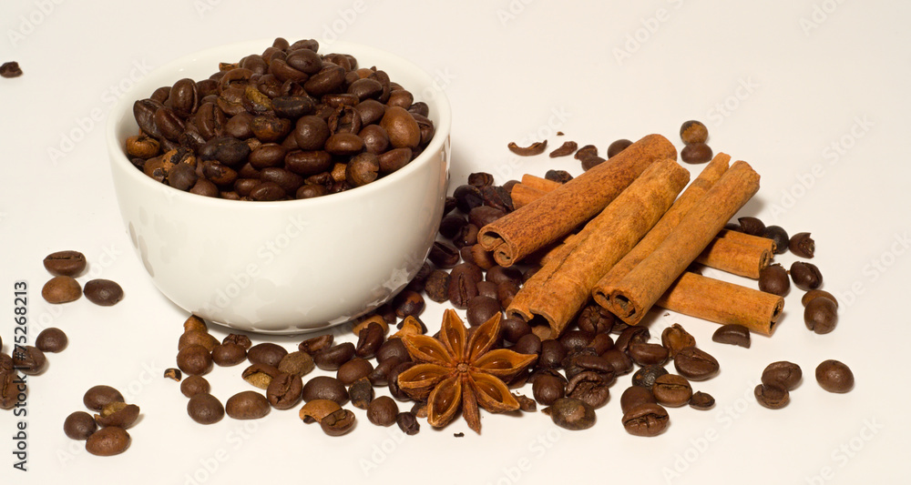 Coffee beans and cinnamon Coffee beans and cinnamon