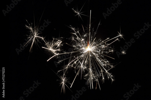 Celebrate party sparkler little fireworks on black background