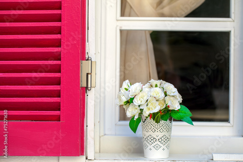 Fototapeta Naklejka Na Ścianę i Meble -  Flowers in Pot near the Window