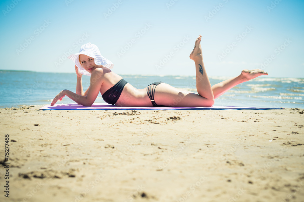 Beautiful woman on a beach Beautiful woman on a beach