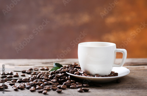 Cup of coffee on wooden table