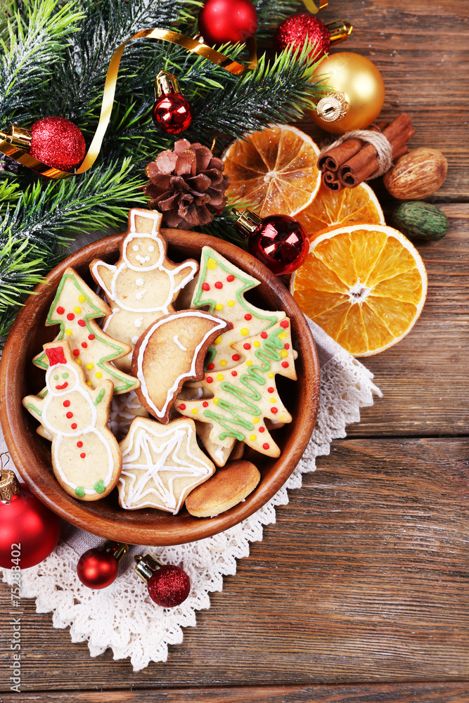 Gingerbread cookies in bowl with Christmas decoration