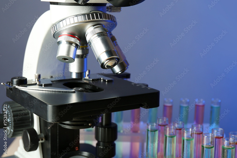 Microscope on color background, close-up Microscope on color background, close-up