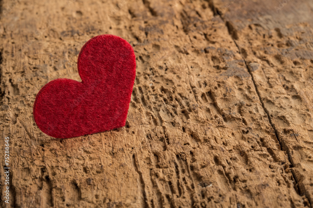 red heart on a wooden background red heart on a wooden background