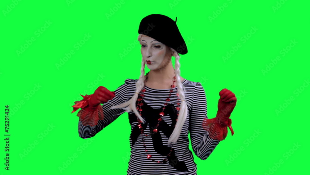 The mime drinks tea from a cup invisible The mime drinks tea from a cup invisible