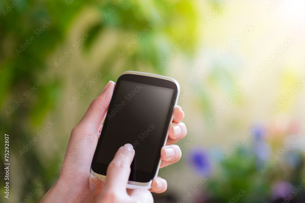 Woman using mobile smart phone.