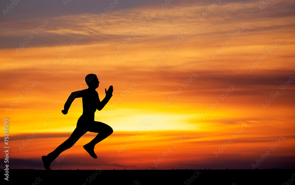 Silhouette of running man against the colorful sky.