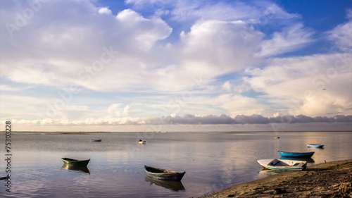 Sunrise timelapse & boat silhouette at Olhão, Algarve.
