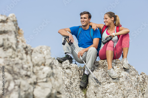 Young couple hiking on the ...