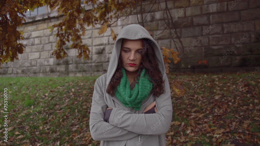 Woman standing on boulevard, steadycam shot, slow motion 240fps Woman standing on boulevard, steadycam shot, slow motion 240fps