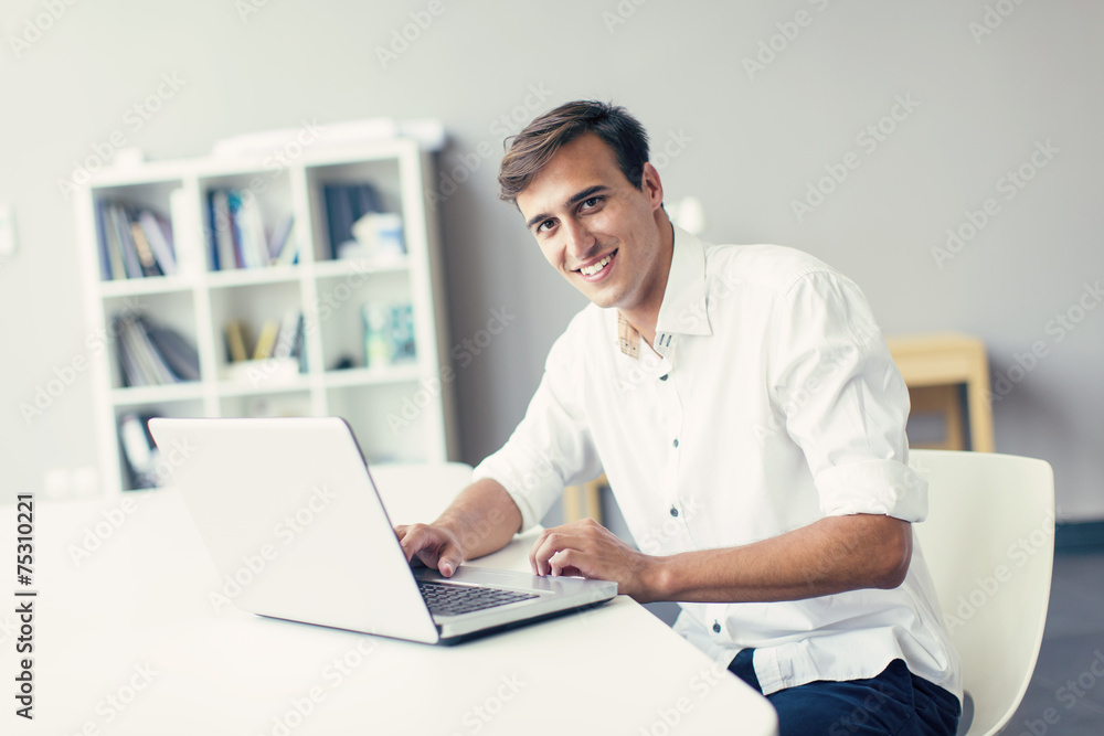 Young man in the office Young man in the office