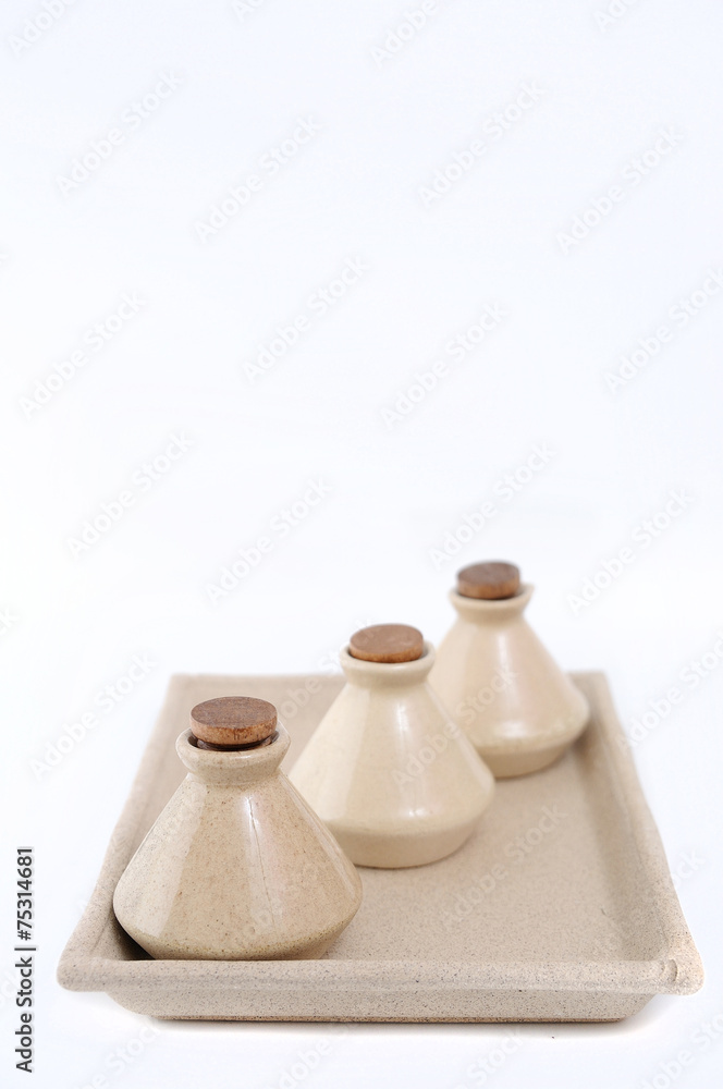 Classic spa clay bottles with cork.