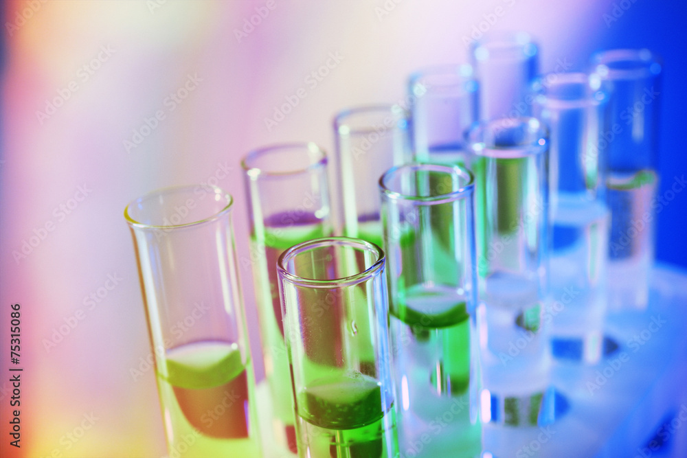 Color fluid in test-tubes on the light background Color fluid in test-tubes on the light background