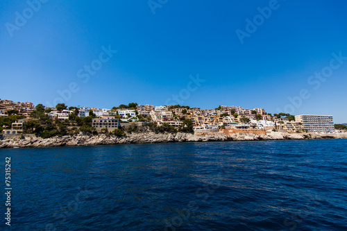 Apartment buildings by Mediterranean Sea.  view of Mallorca coas © EwaStudio