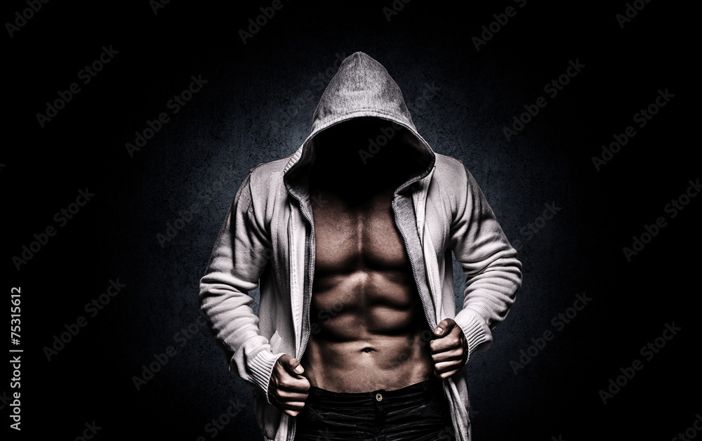 strong athletic man on black background - obrazy, fototapety, plakaty 