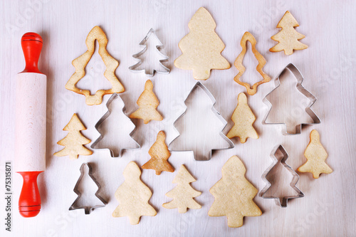 Gingerbread cookies with copper cookie cutter and rolling pin