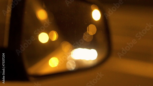 View of wing mirror at night