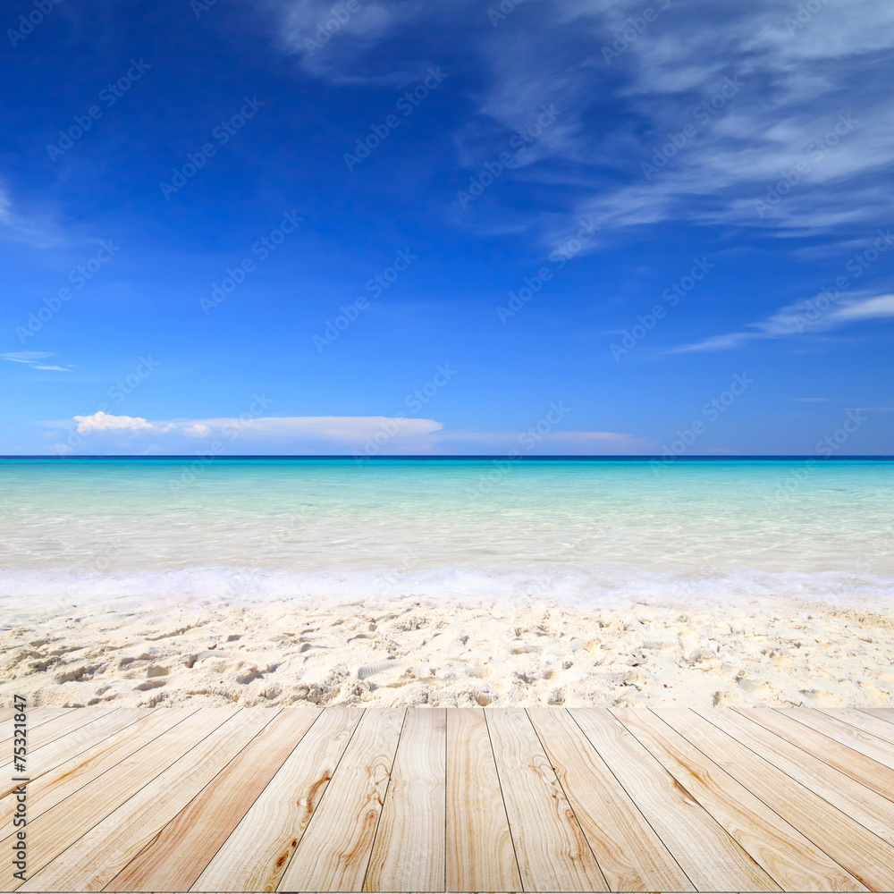 Fototapeta premium Wood table on blurred beach background