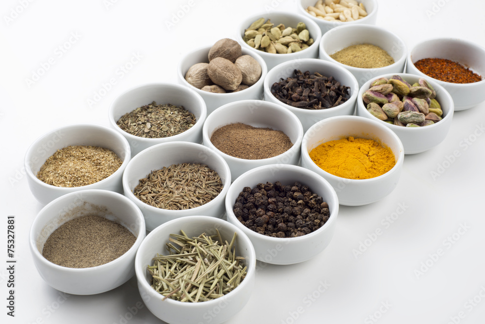 large collection of different spices and herbs isolated on white large collection of different spices and herbs isolated on white