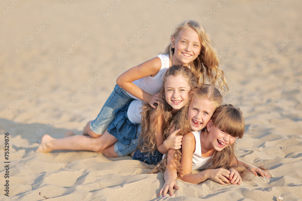 Portrait of children on the beach in summer Portrait of children on the beach in summer
