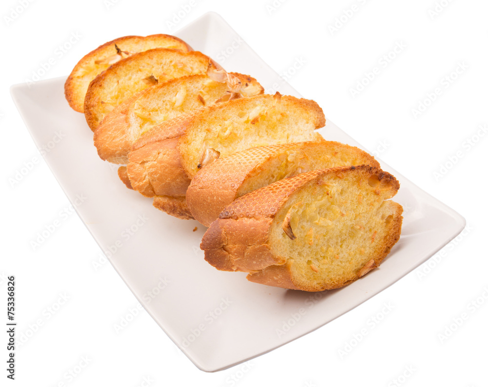 Homemade garlic bread of French baguette slices 