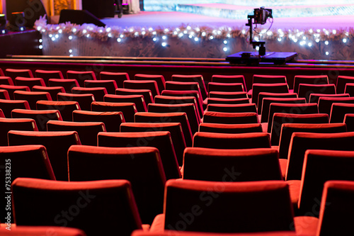 Empty theater chairs