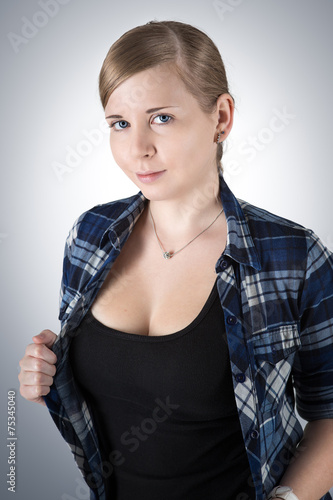 Fashion portrait of young woman in casual outfit 