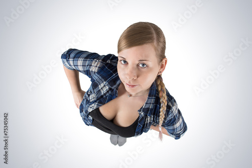 Attractive young woman in shirt. View from the top. 