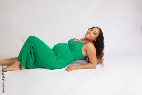 Fotótapéta Pregnant woman reclining
