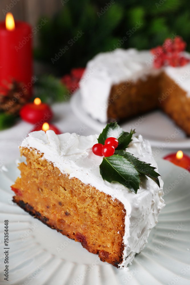 Slice of cake covered cream with Christmas decoration Slice of cake covered cream with Christmas decoration