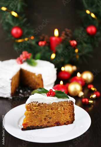 Slice of cake covered cream with Christmas decoration