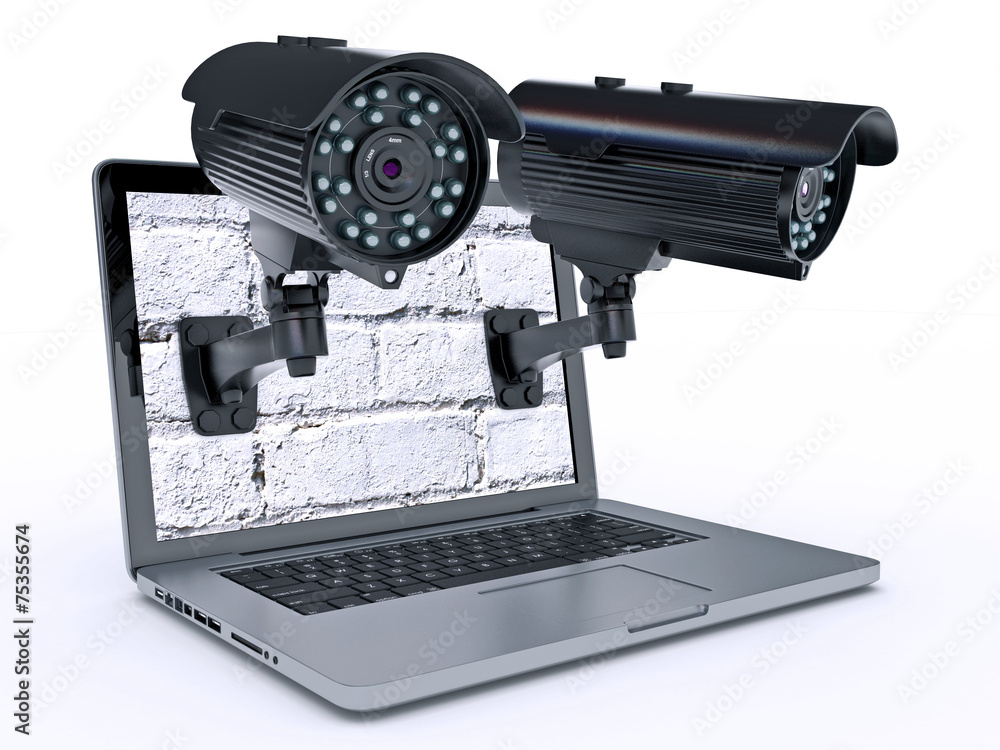 Fototapeta premium Video surveillance camera and laptop