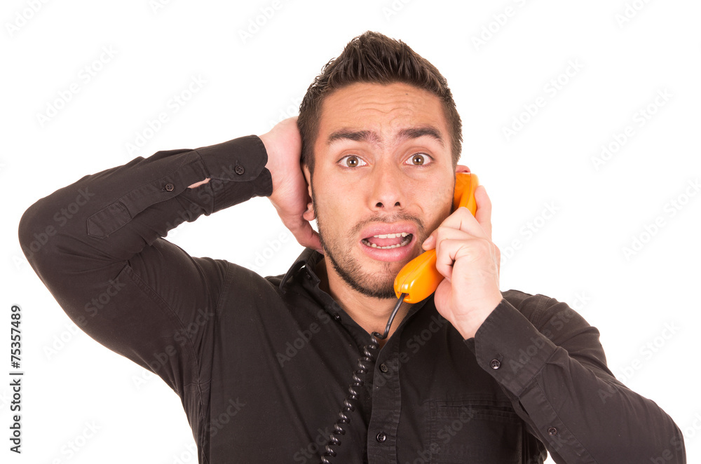 closeup portrait of handsome hispanic man talking on corded closeup portrait of handsome hispanic man talking on corded