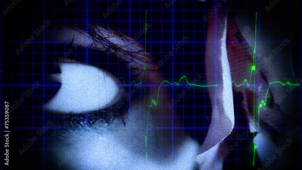 EKG heartbeat woman eye detail Stock Video Adobe Stock