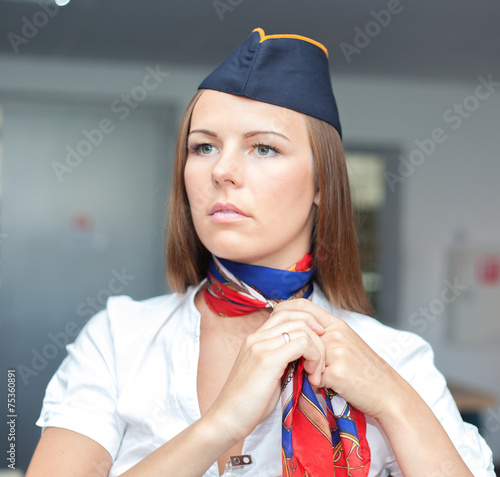 Attractive brunette stewardess