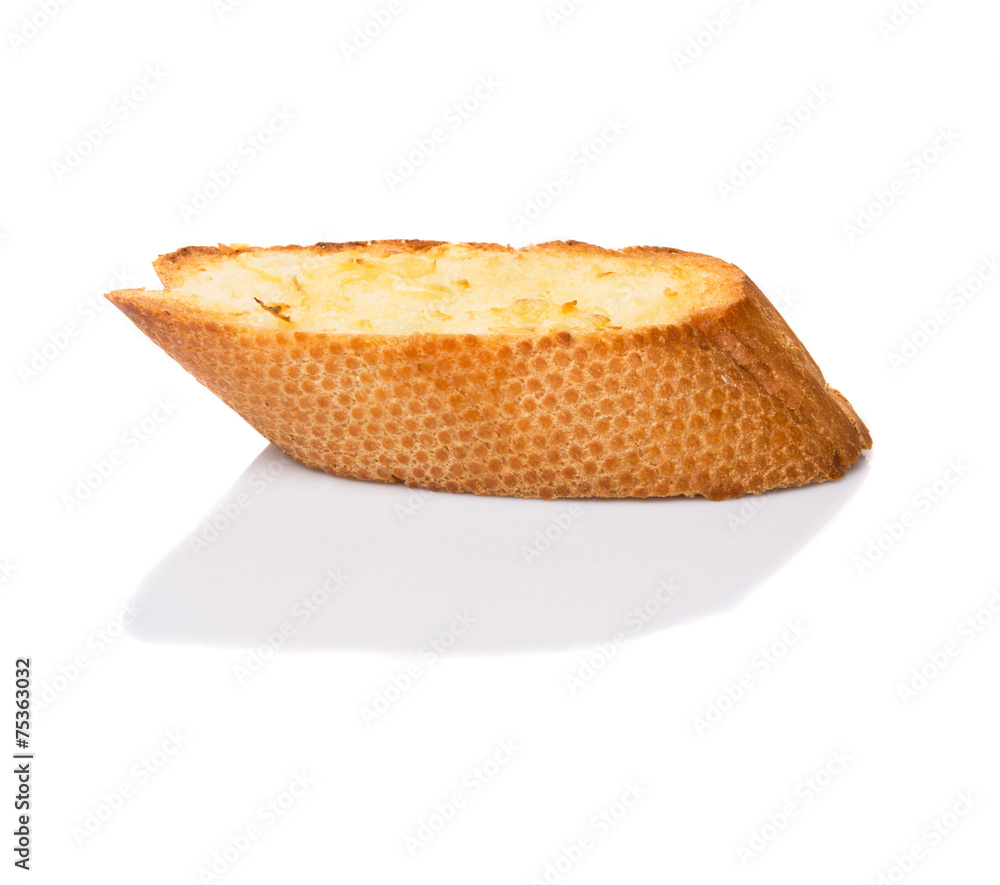 Homemade garlic bread of French baguette over white background Homemade garlic bread of French baguette over white background