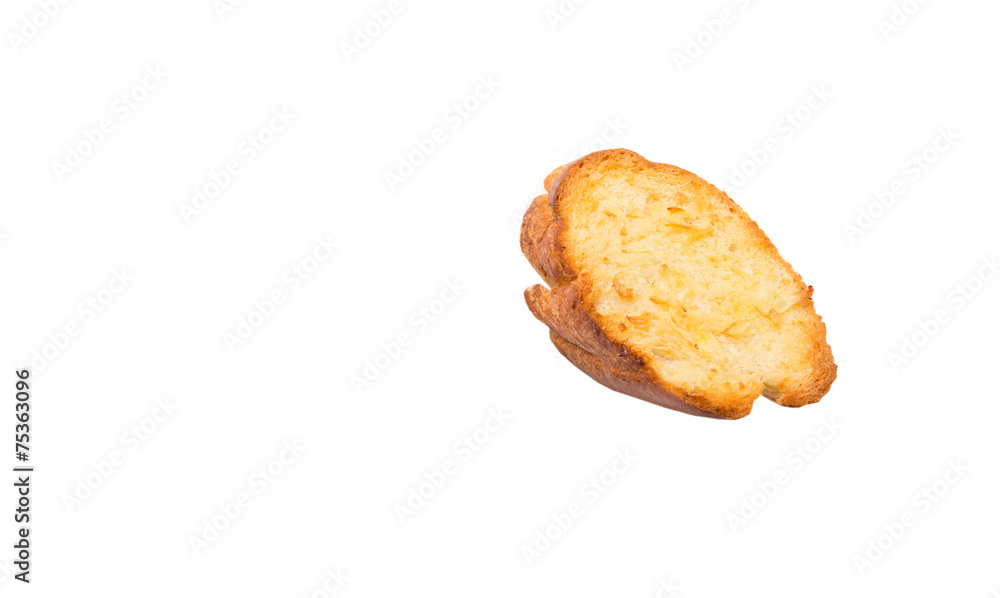 Homemade garlic bread of French baguette over white background Homemade garlic bread of French baguette over white background