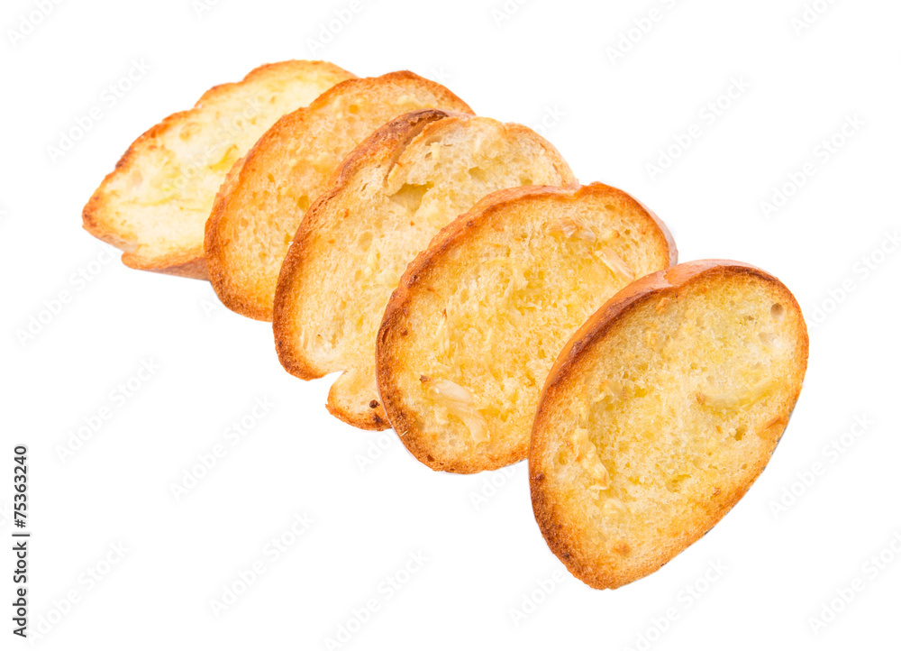 Homemade garlic bread of French baguette over white background Homemade garlic bread of French baguette over white background