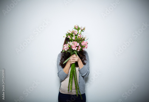 Smelling flowers photo