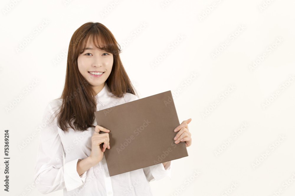 Young Asian Woman Holding a Blank Brown Sign Young Asian Woman Holding a Blank Brown Sign
