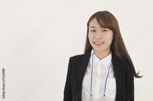 Beautiful young asian businesswoman with id card