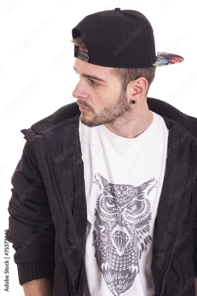 Portrait of young handsome guy wearing black cap Portrait of young handsome guy wearing black cap