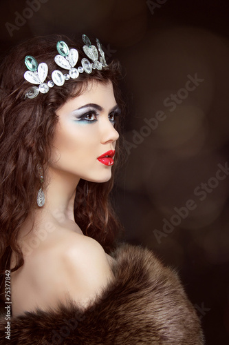Принти на полотні Fashion beautiful woman posing in fur coat. Winter Girl Model in