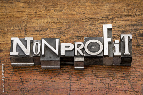 nonprofit word in metal type photo