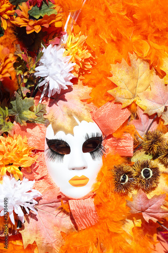 Fototapeta Naklejka Na Ścianę i Meble -  Autumn mask at the Carnival of Venice